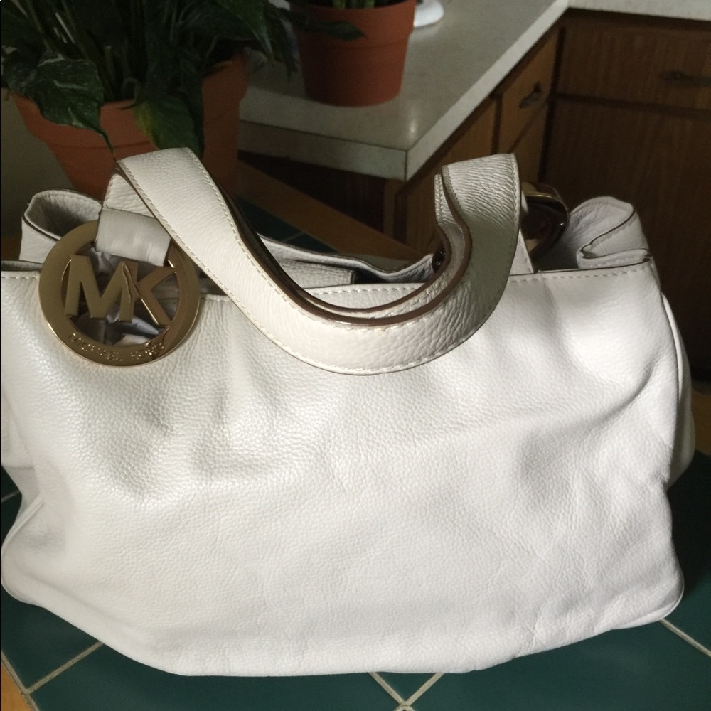 Michael Kors cream leather handbag.